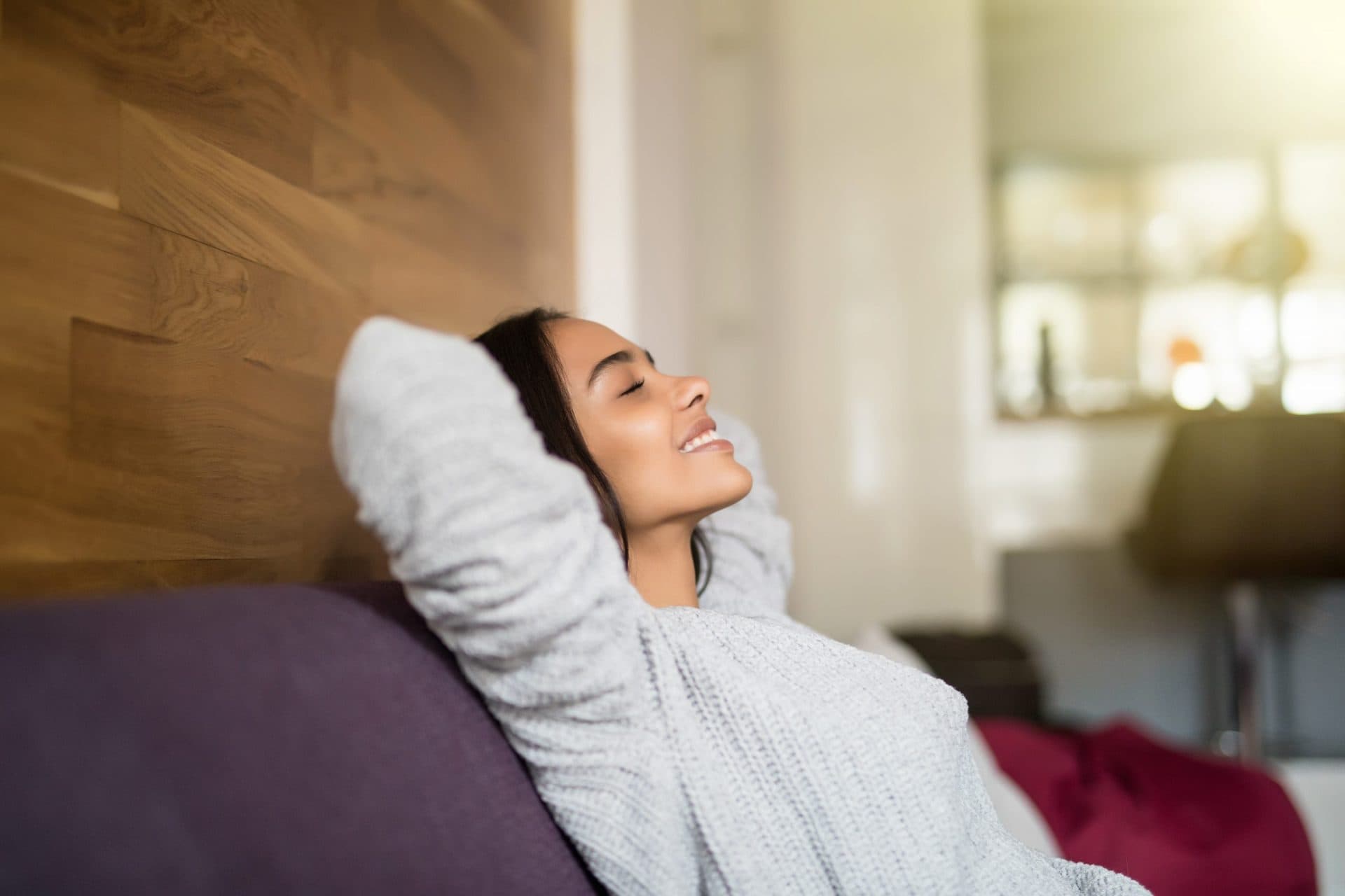 A business owner leaning back, relaxed, with time to think